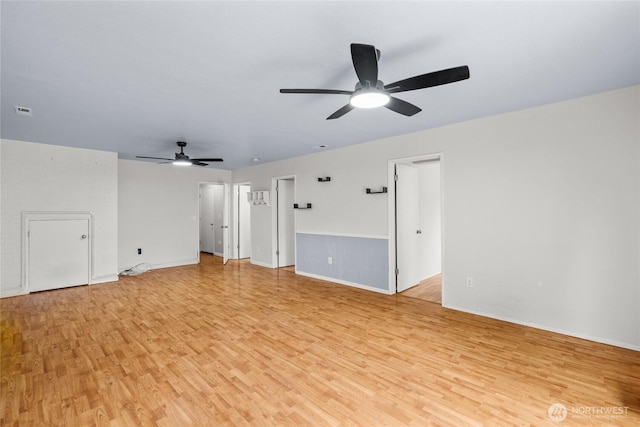 742 N 103rd St, Seattle, WA 98133 - empty room featuring a ceiling fan and light wood finished floors