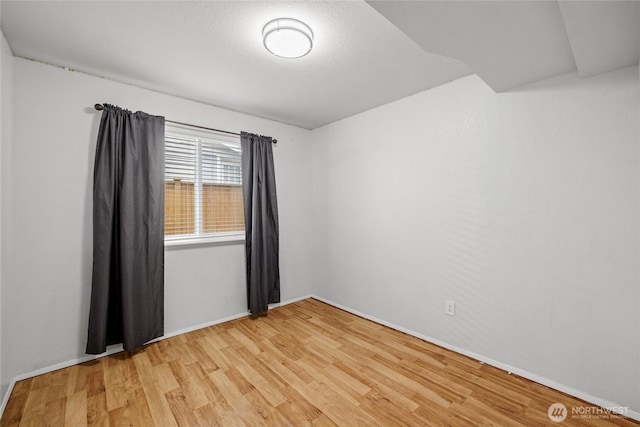 742 N 103rd St, Seattle, WA 98133 - unfurnished room with light wood-style flooring and baseboards