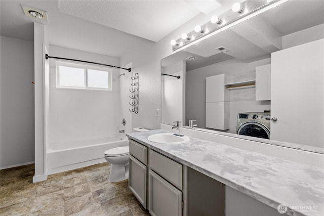 742 N 103rd St, Seattle, WA 98133 - bathroom featuring washer / dryer, shower / bath combination, and vanity