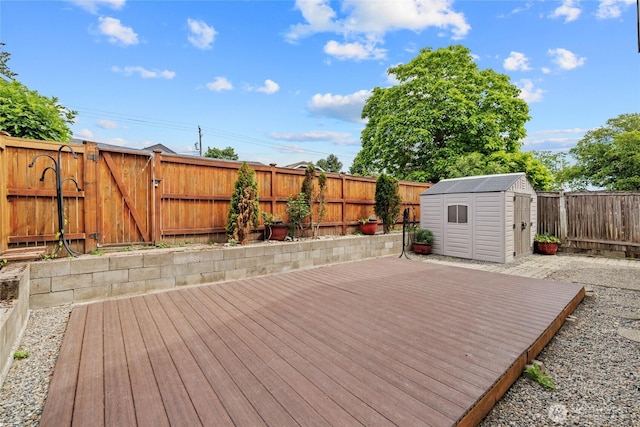 742 N 103rd St, Seattle, WA 98133 - wooden terrace with a storage shed, a fenced backyard, and a gate