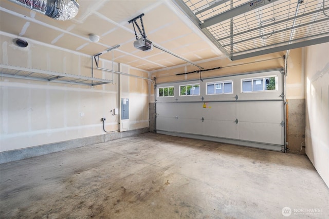 17477 NE 123rd Way, Redmond, WA 98052 - garage featuring a garage door opener and electric panel