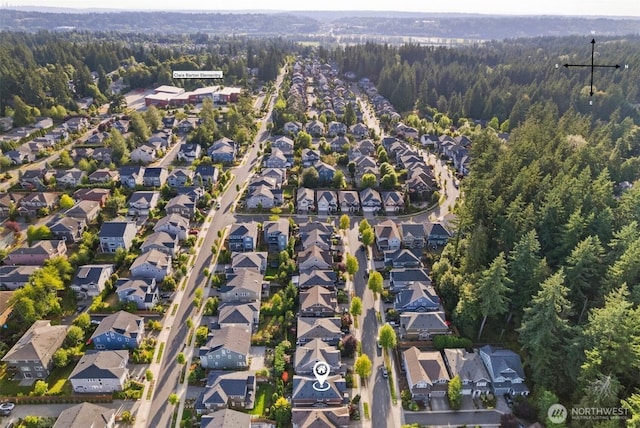 17477 NE 123rd Way, Redmond, WA 98052 - aerial view of property and surrounding area featuring a heavily wooded area and nearby suburban area