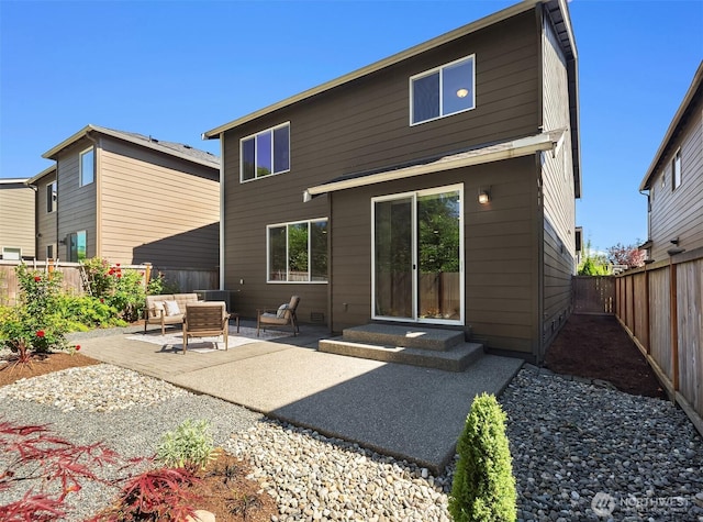 12611 37th Pl NE, Lake Stevens, WA 98258 - back of house featuring an outdoor living space, a patio, and a fenced backyard