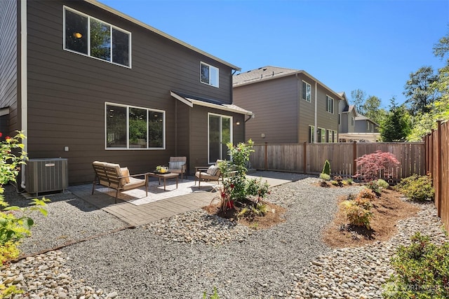 12611 37th Pl NE, Lake Stevens, WA 98258 - back of house with a fenced backyard, a patio, and outdoor lounge area