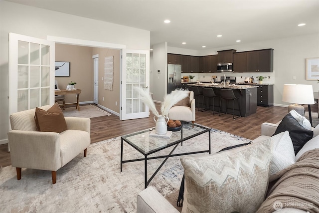 12611 37th Pl NE, Lake Stevens, WA 98258 - living area featuring wood finished floors and recessed lighting
