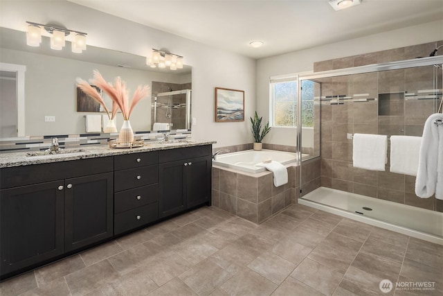 12611 37th Pl NE, Lake Stevens, WA 98258 - full bath featuring a garden tub, double vanity, and a stall shower