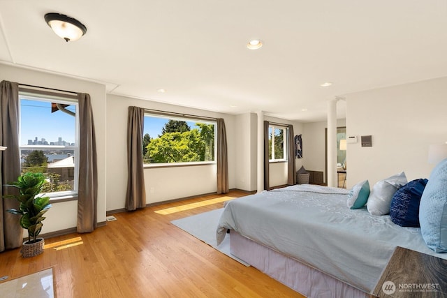 2218 N 38th St, Seattle, WA 98103 - bedroom with light wood-style flooring and recessed lighting
