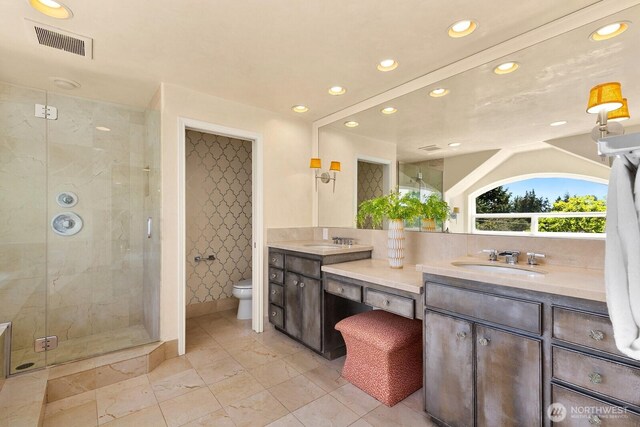 2218 N 38th St, Seattle, WA 98103 - full bath with recessed lighting, double vanity, and a shower stall