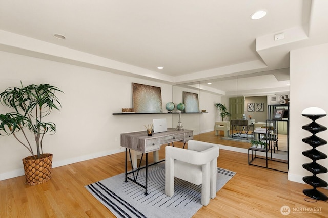 2218 N 38th St, Seattle, WA 98103 - home office with a tray ceiling, wood finished floors, and recessed lighting
