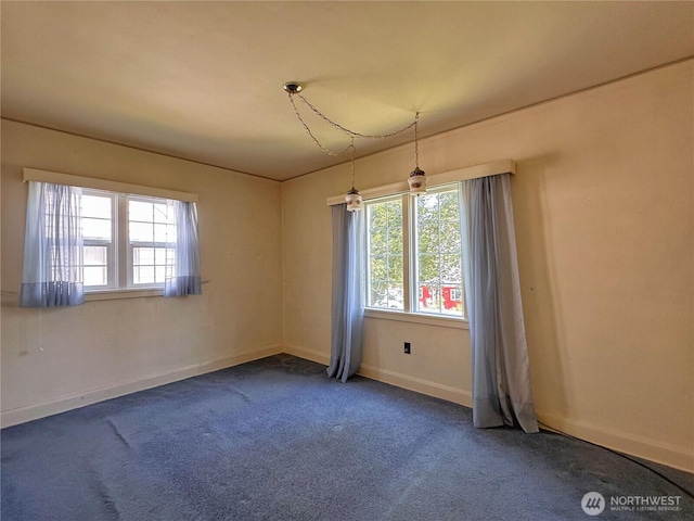 304 Columbia Ave, Coulee Dam, WA 99116 - unfurnished room with plenty of natural light and carpet flooring