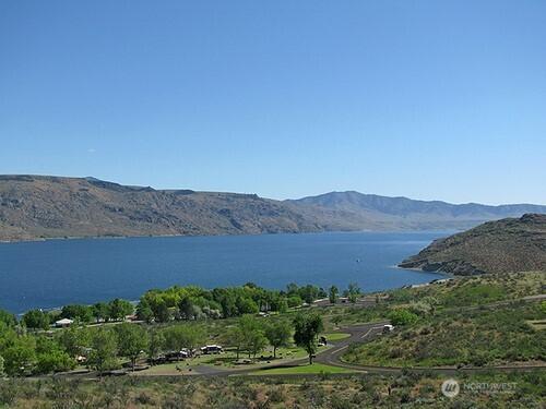 304 Columbia Ave, Coulee Dam, WA 99116 - water view featuring a mountain backdrop