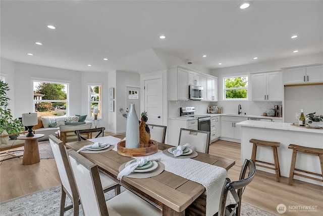 1215 N 10th St, Tacoma, WA 98403 - dining area with recessed lighting and light wood finished floors