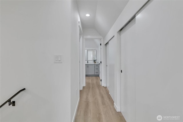 1215 N 10th St, Tacoma, WA 98403 - corridor with light wood-style flooring, lofted ceiling, and recessed lighting