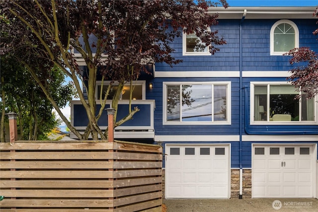 2344 44th Ave SW Unit B, Seattle, WA 98116 - view of property exterior with an attached garage