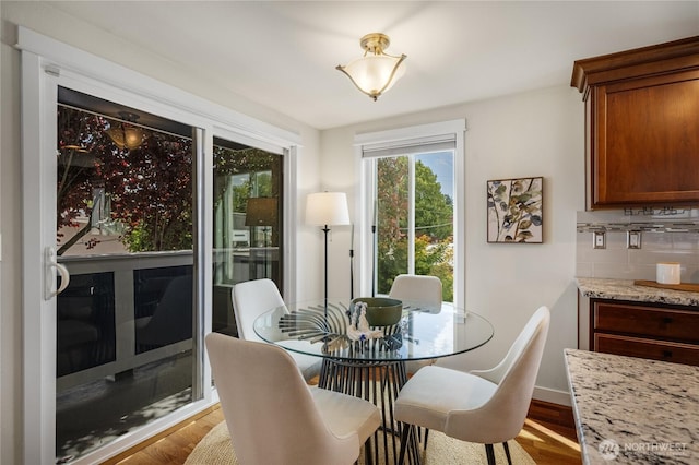 2344 44th Ave SW Unit B, Seattle, WA 98116 - dining area featuring light wood-style flooring