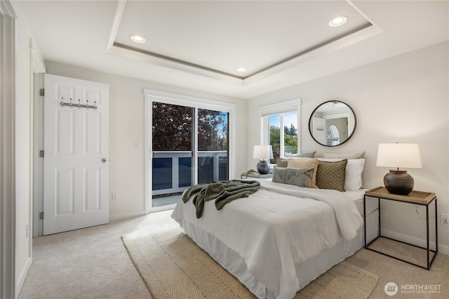2344 44th Ave SW Unit B, Seattle, WA 98116 - bedroom featuring access to outside, light carpet, recessed lighting, and a tray ceiling