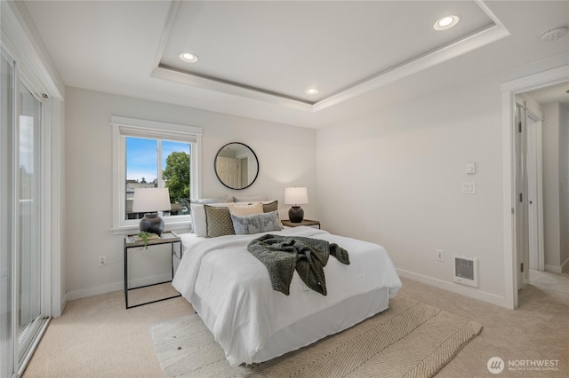 2344 44th Ave SW Unit B, Seattle, WA 98116 - bedroom with light colored carpet, a tray ceiling, and recessed lighting