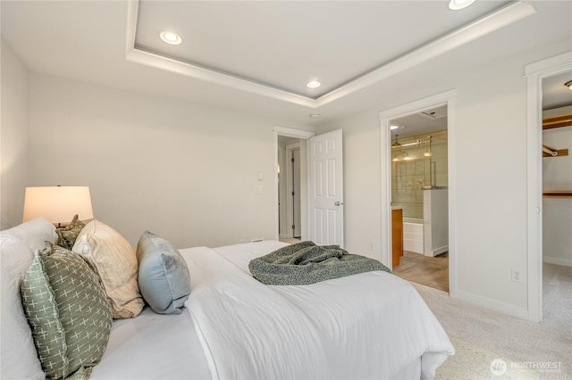 2344 44th Ave SW Unit B, Seattle, WA 98116 - bedroom featuring recessed lighting, a walk in closet, carpet flooring, a raised ceiling, and ensuite bath