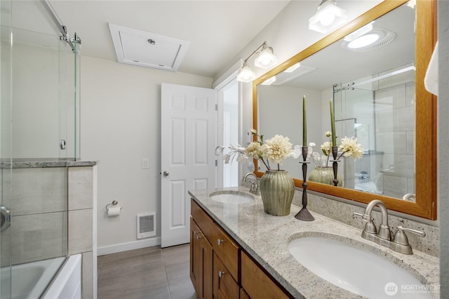 2344 44th Ave SW Unit B, Seattle, WA 98116 - full bath featuring double vanity, shower / bath combination with glass door, and tile patterned floors
