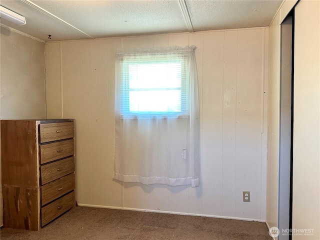 5626 SW 113th Ave E Unit 63, Puyallup, WA 98372 - unfurnished bedroom featuring carpet and a textured ceiling