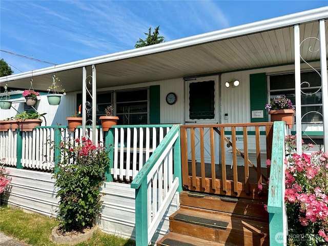 5626 SW 113th Ave E Unit 63, Puyallup, WA 98372 - property entrance featuring covered porch