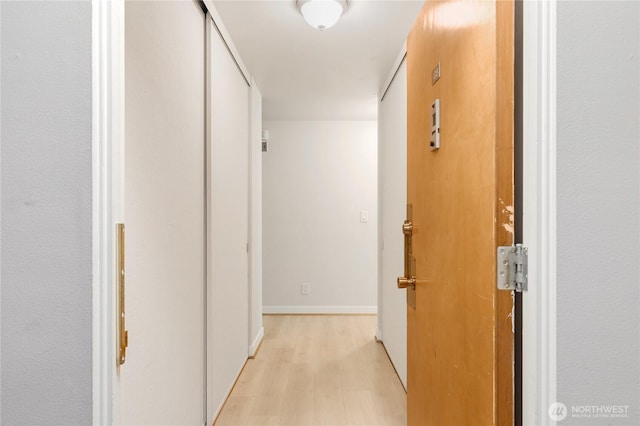 5101 NE 55th St Unit 103, Seattle, WA 98105 - corridor with light wood-style floors and baseboards