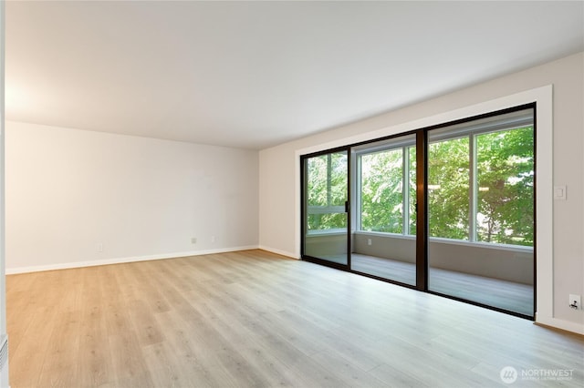 5101 NE 55th St Unit 103, Seattle, WA 98105 - unfurnished room featuring light wood-style floors
