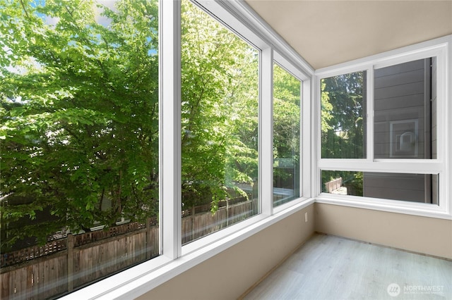 5101 NE 55th St Unit 103, Seattle, WA 98105 - unfurnished sunroom with wood finished floors