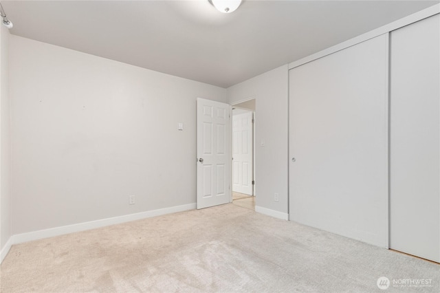 5101 NE 55th St Unit 103, Seattle, WA 98105 - unfurnished bedroom featuring carpet flooring and a closet