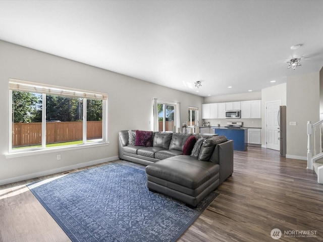 11040 22nd Pl NE, Lake Stevens, WA 98258 - living room with dark wood-style floors, recessed lighting, and stairs