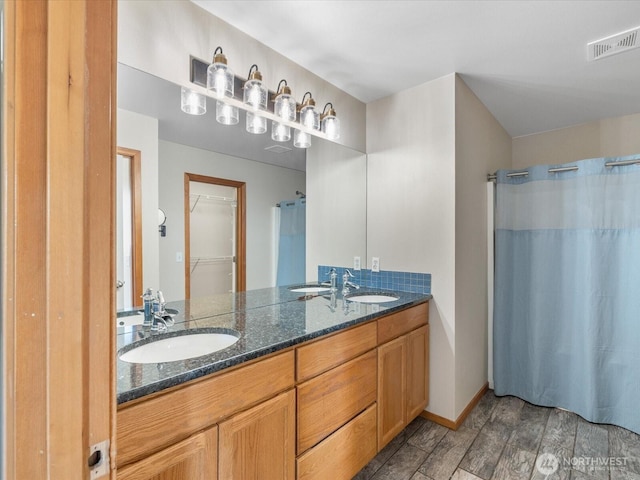 11040 22nd Pl NE, Lake Stevens, WA 98258 - full bath with double vanity, a shower with shower curtain, and a spacious closet