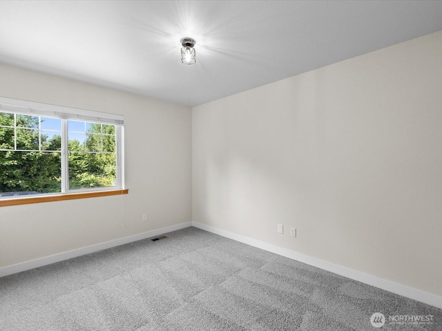11040 22nd Pl NE, Lake Stevens, WA 98258 - carpeted empty room featuring baseboards