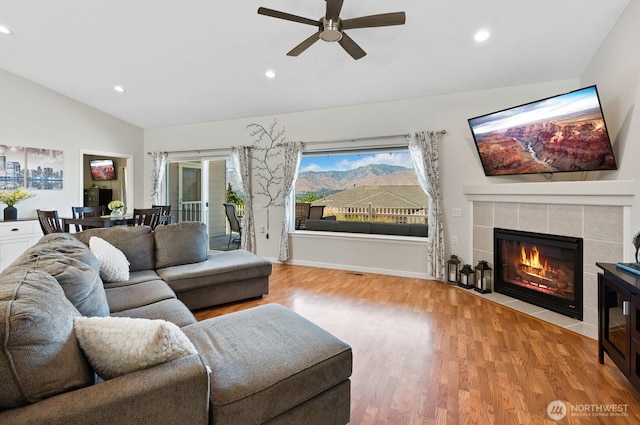 2615 N Baker Ave, East Wenatchee, WA 98802 - living area with lofted ceiling, ceiling fan, light wood-style floors, recessed lighting, and a fireplace