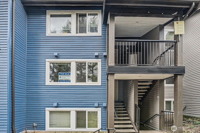 26339 116th Ave SE Unit I202, Kent, WA 98030 - back of house with a balcony and stairway