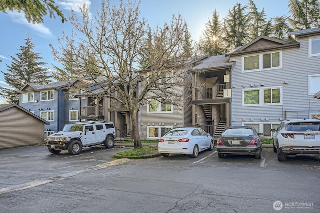 26339 116th Ave SE Unit I202, Kent, WA 98030 - view of front of house featuring uncovered parking