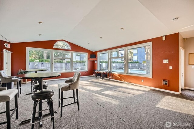 26339 116th Ave SE Unit I202, Kent, WA 98030 - dining space with vaulted ceiling and carpet flooring