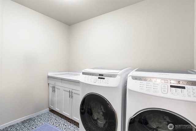 4613 234th Pl SE, Bothell, WA 98021 - laundry room featuring separate washer and dryer and cabinet space