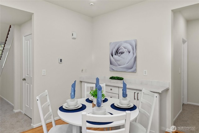 7526 148th Pl SE, Snohomish, WA 98296 - dining area featuring stairs and baseboards