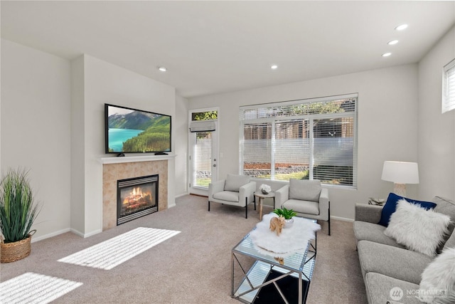 7526 148th Pl SE, Snohomish, WA 98296 - living area with a tile fireplace, recessed lighting, and carpet