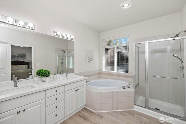 7526 148th Pl SE, Snohomish, WA 98296 - ensuite bathroom featuring a shower stall, a garden tub, and double vanity