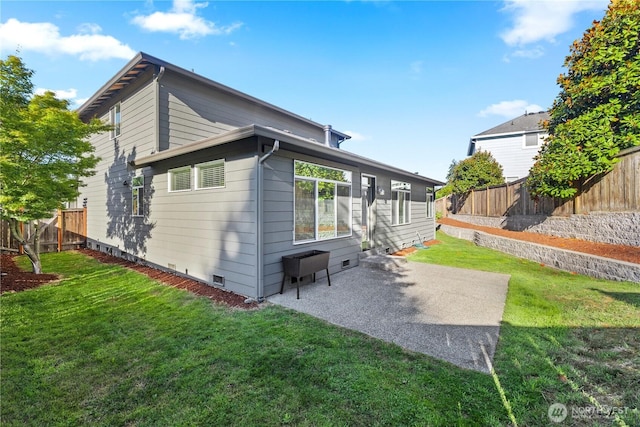7526 148th Pl SE, Snohomish, WA 98296 - back of house featuring a patio, a fenced backyard, and crawl space