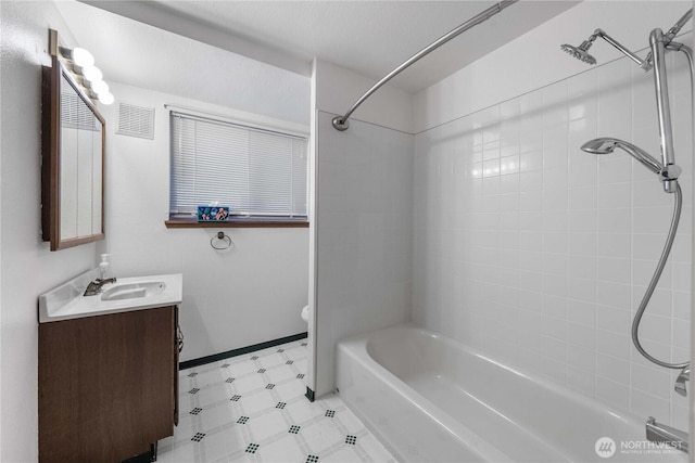 22223 10th Ave S, Des Moines, WA 98198 - bathroom with vanity, shower / bathtub combination, and tile patterned floors