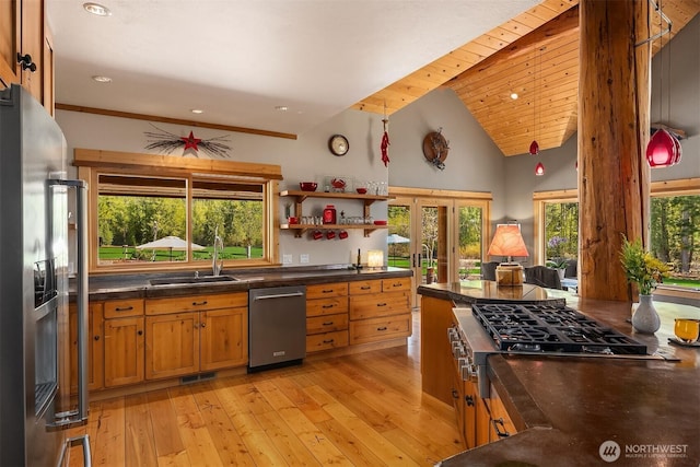 639 A Twisp River Rd, Twisp, WA 98856 - kitchen featuring appliances with stainless steel finishes, french doors, light wood-style floors, dark countertops, and recessed lighting