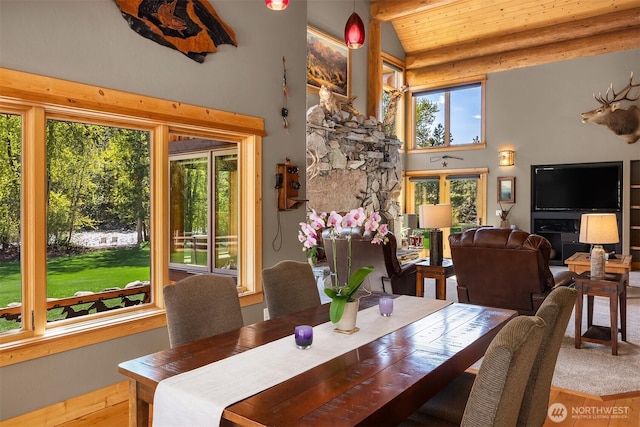 639 A Twisp River Rd, Twisp, WA 98856 - dining space featuring wood ceiling, high vaulted ceiling, and wood finished floors