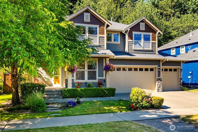 1422 Brighton Way SE, Olympia, WA 98501 - craftsman house with an attached garage, driveway, stone siding, and a shingled roof