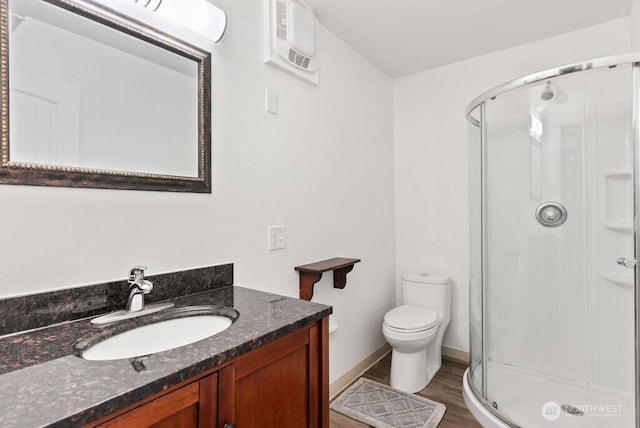 6114 47th Street Ct W, University Place, WA 98466 - bathroom featuring a shower stall, vanity, and wood finished floors