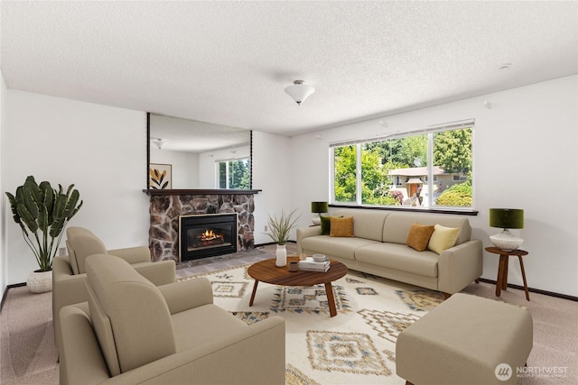 6114 47th Street Ct W, University Place, WA 98466 - living room featuring carpet flooring, a stone fireplace, and a textured ceiling