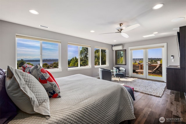 6511 108th Ave NE Unit 3, Kirkland, WA 98033 - bedroom with access to exterior, a wall mounted air conditioner, wood finished floors, recessed lighting, and ceiling fan