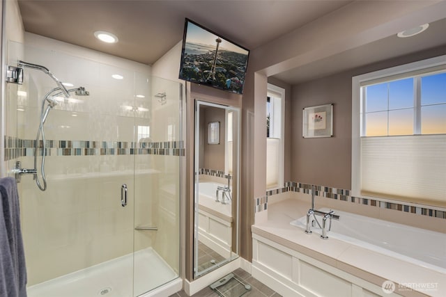 6511 108th Ave NE Unit 3, Kirkland, WA 98033 - bathroom featuring a shower stall, a bath, tile patterned floors, and recessed lighting