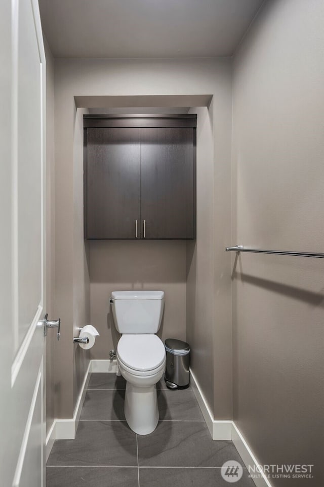 6511 108th Ave NE Unit 3, Kirkland, WA 98033 - bathroom featuring baseboards and tile patterned floors